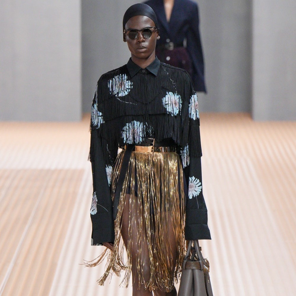 Неделя моды в Милане: женственный утилитарный показ Prada